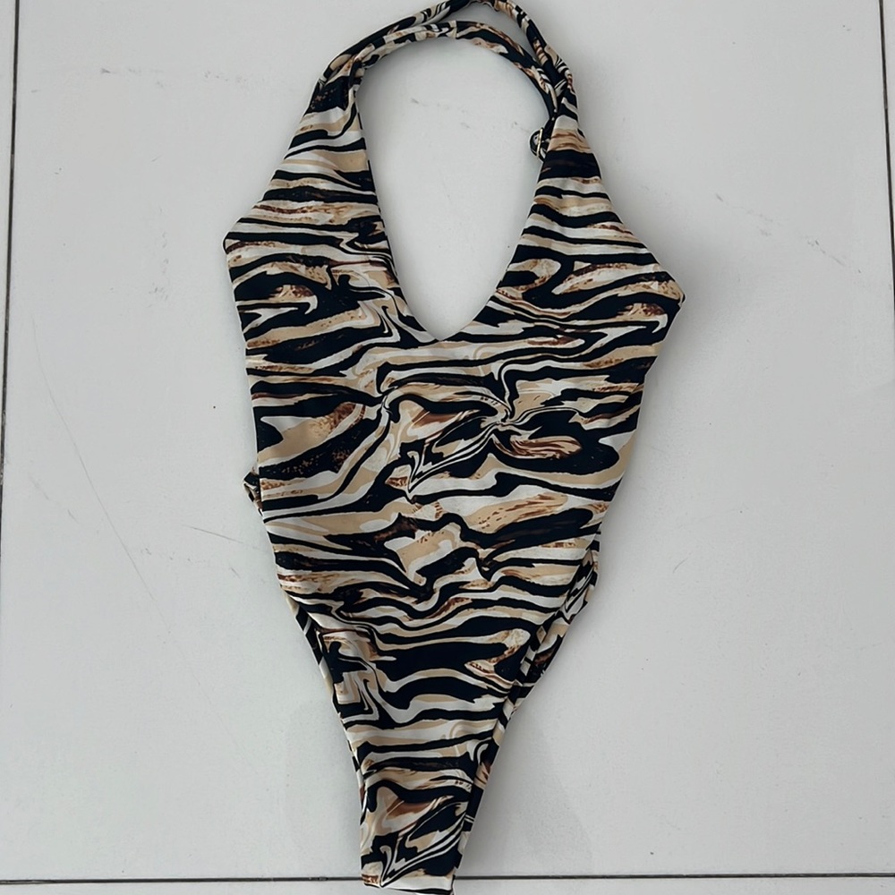 NWT XS SKATIE sexy low cut front high cut legs tongs back swimming suit